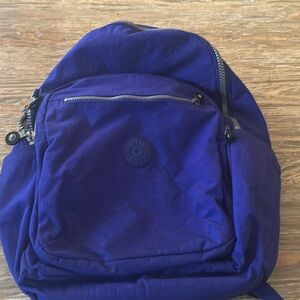 Nice blueish purple Kipling full size backpack 
Very gently used